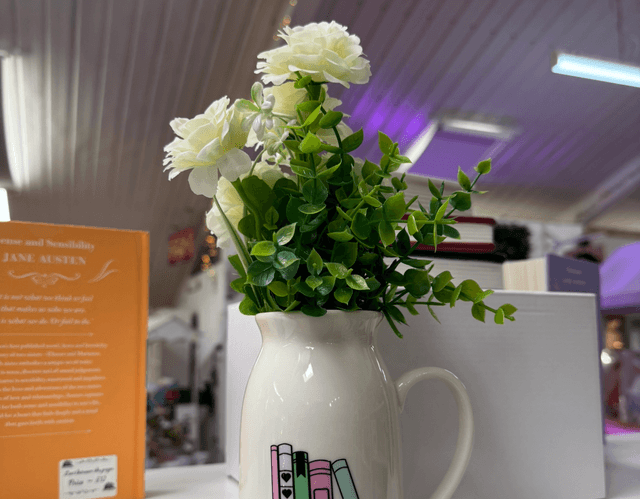 Bookaholic milk jug flower pot 